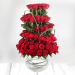 101 red roses beautifully designed in a fish bowl.