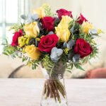 Combination of Yellow & Red Roses with Vase Cylinder