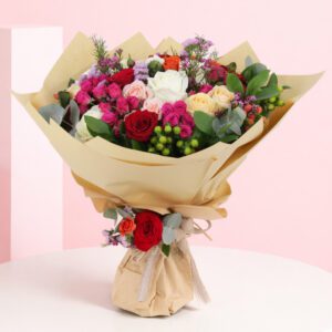 An elegant arrangement of colorful flowers, exuding charm and beauty, ideal for celebrating special moments.