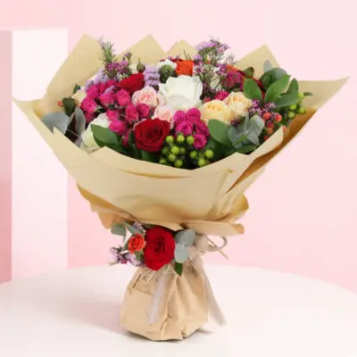 An elegant arrangement of colorful flowers, exuding charm and beauty, ideal for celebrating special moments.