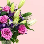 lavish-purple-roses-with-lily-in-vase_2026_03