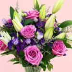 lavish-purple-roses-with-lily-in-vase_2026_04