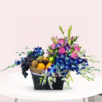 A vibrant basket of assorted flowers rests on a table, adding a touch of nature to the setting.