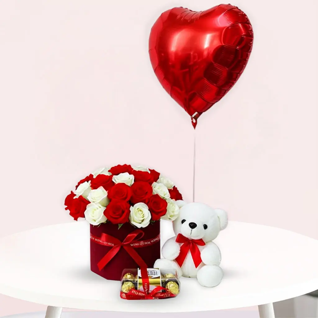 A soft teddy bear beside a bright red heart-shaped balloon, symbolizing love and affection.