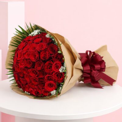 A beautiful bouquet featuring 50 red roses, a classic symbol of love and romance, ideal for special occasions.