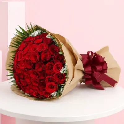 A beautiful bouquet featuring 50 red roses, a classic symbol of love and romance, ideal for special occasions.