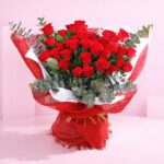 A stunning bunch of 36 red roses, symbolizing deep love and romance, elegantly arranged for a heartfelt gift.