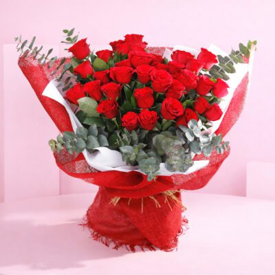 A stunning bunch of 36 red roses, symbolizing deep love and romance, elegantly arranged for a heartfelt gift.