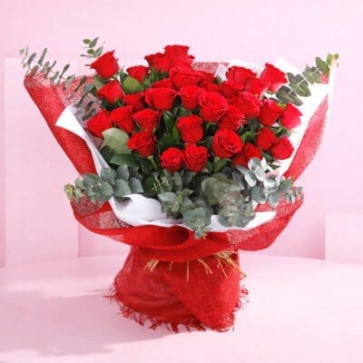 A stunning bunch of 36 red roses, symbolizing deep love and romance, elegantly arranged for a heartfelt gift.