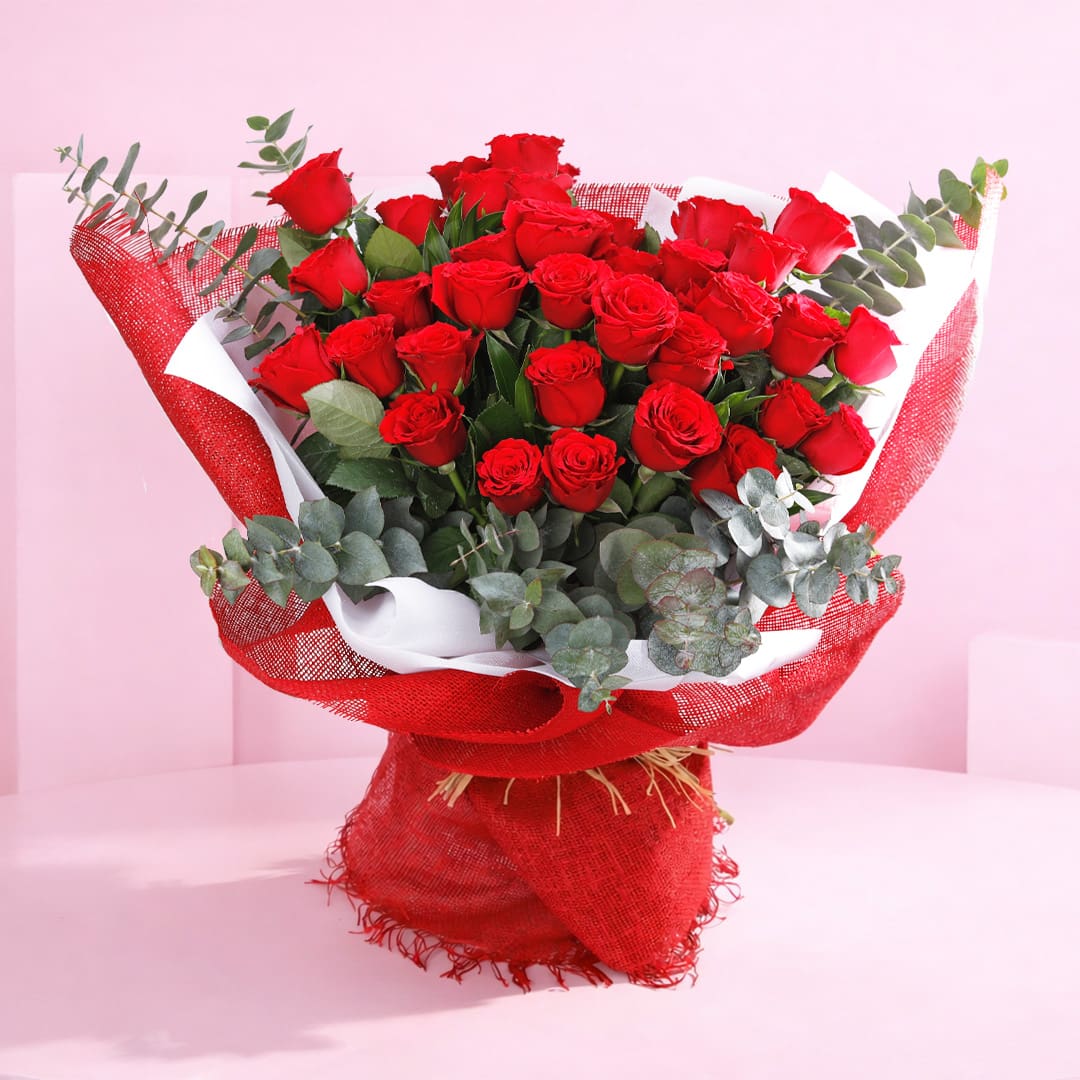 bunch-of-36-roses-2026 A stunning bunch of 36 red roses, symbolizing deep love and romance, elegantly arranged for a heartfelt gift.