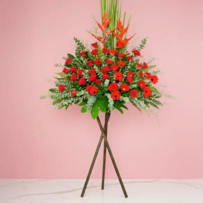 A Large Stand Arrangement Featuring Red Roses, Gerberas, And Seasonal Greenery For The Grand Opening Of Crab 2stem.