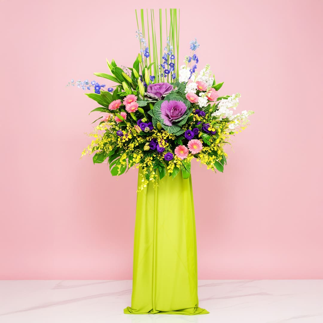 official-opening-25 The Purple Flowers And Green Leaves, Complemented By Seasonal Greenery And Diverse Flower Stems For The Occasion.