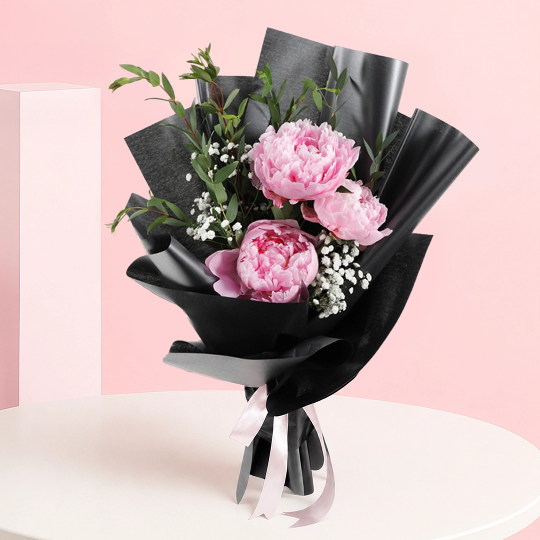sleek-black-peony-delight_2026 A vibrant Pink Peonies Bouquet featuring hand-picked blossoms, showcasing nature's beauty and contemporary elegance.