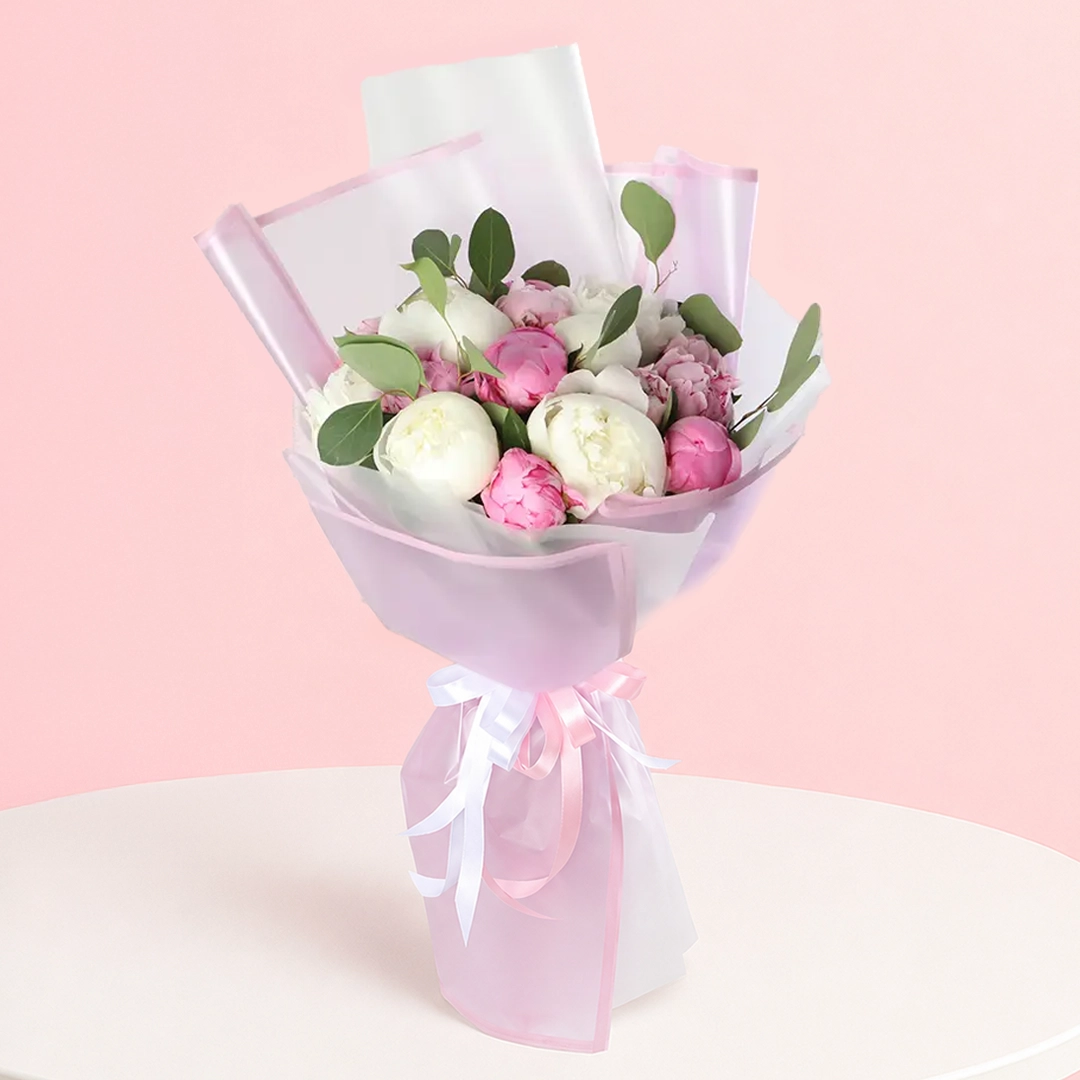 white-and-pink-peonies-bouquet_2026 A bouquet of delicate peonies, showcasing their beauty and elegance, symbolizing the development of relationships.