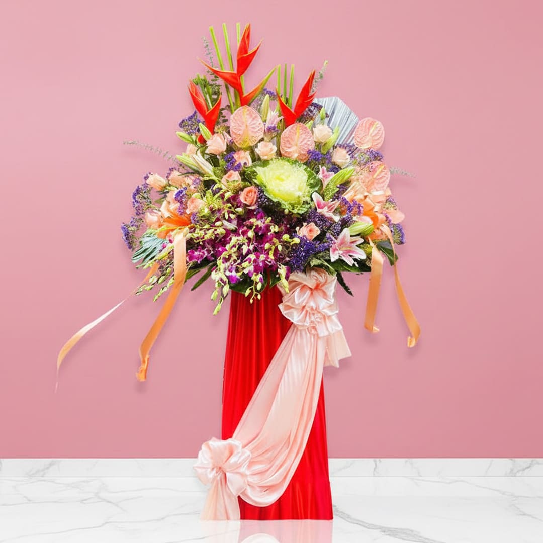 Magnificent Grand Opening Stand-01-48 A lively floral arrangement in a vase on a pink wall, bursting with colors that convey hope and the spirit of fresh starts.