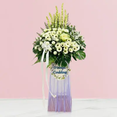 A heartfelt condolence stand featuring a bouquet of white flowers