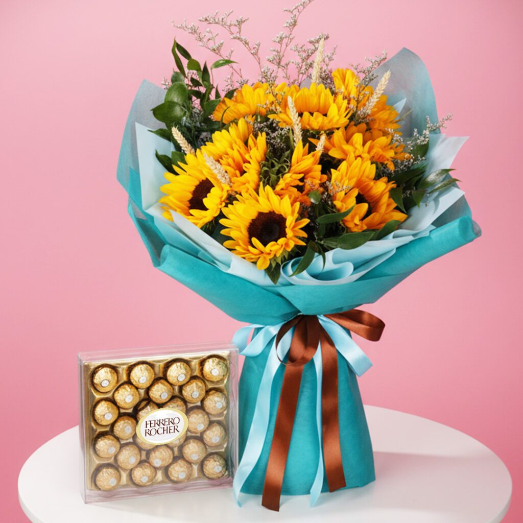 A vibrant bouquet of sunflowers accompanied by an assortment of chocolates, creating a cheerful gift arrangement.