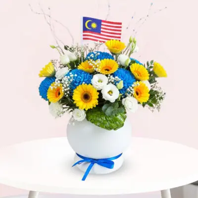 A white vase adorned with a blue ribbon, elegantly showcasing its decorative design.