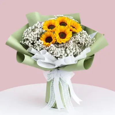 A vibrant bouquet featuring bright sunflowers surrounded by delicate sprigs of baby's breath.