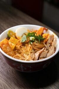 Laksa is a spicy noodle soup dish popular in Southeast Asia, particularly in Malaysia, Singapore, and Indonesia.
