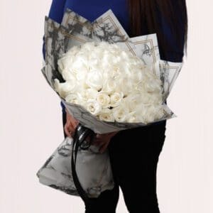A timeless classic, a bouquet of pure white roses.