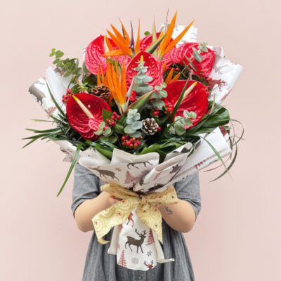 An Exotic Christmas Bouquet Adorned With Unique Flowers