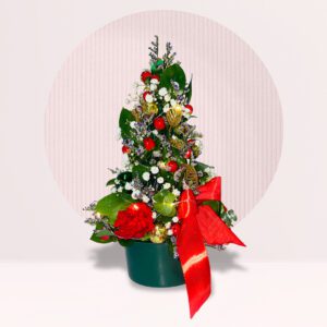 The arrangement is shaped like a Christmas tree, with green foliage as the base.