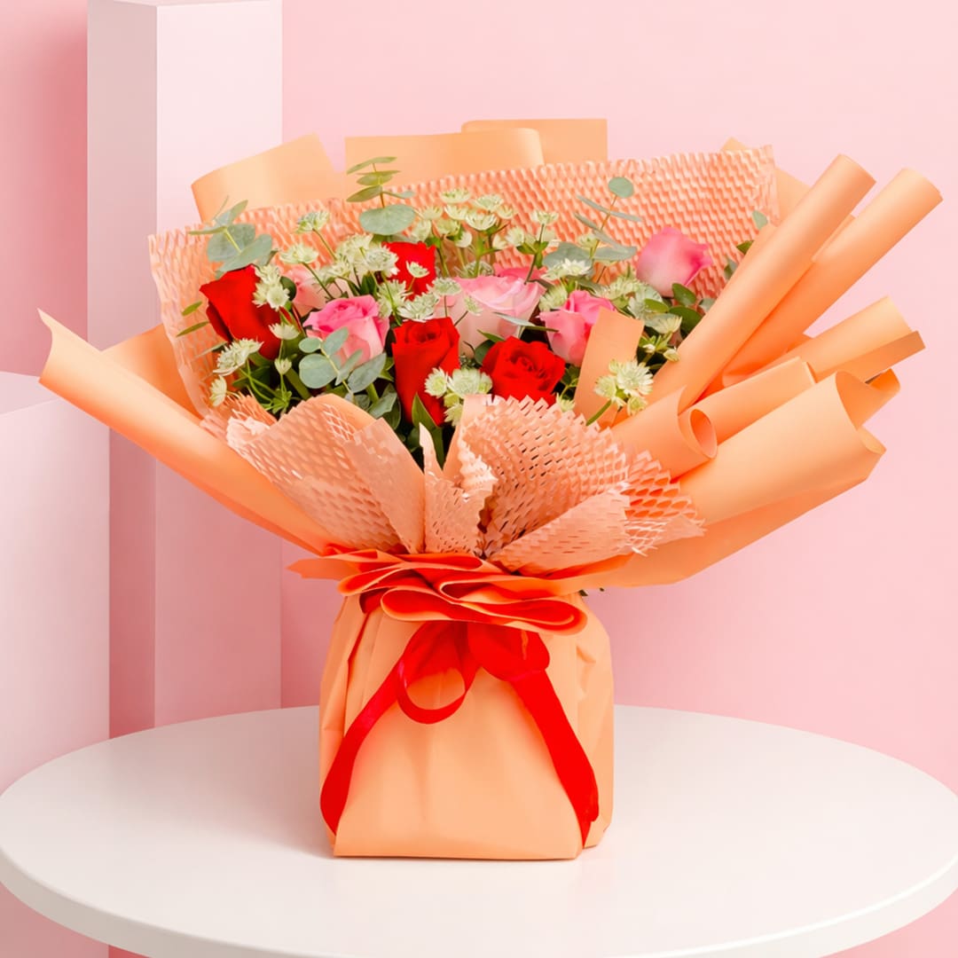 peachy-rose-bouquet-2026 A charming bouquet of peach roses presented in a stylish