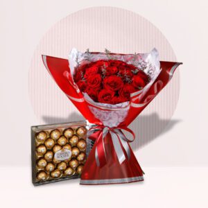 A bouquet of red roses and a box of Ferrero Rocher chocolates.