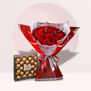 A bouquet of red roses and a box of Ferrero Rocher chocolates.