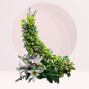 The arrangement is uniquely shaped in a crescent or curved form, rising from the bottom left to the top right. This shape creates a dynamic and visually interesting composition.