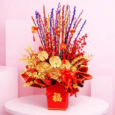 Prosperity flower Box with Lucky stems, red berry accents, and gold foliage in a red Chinese New Year box arrangement, finished with hanging CNY ornaments
