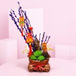 Fortune CNY Moss Bowl Centerpiece with lucky stems, green moss, and botanical accents finished with red Chinese New Year charms and prosperity tags.