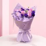 pink purple mixed rose and baby’s breath in lavender wrap