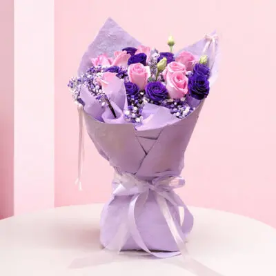 pink purple mixed rose and baby’s breath in lavender wrap
