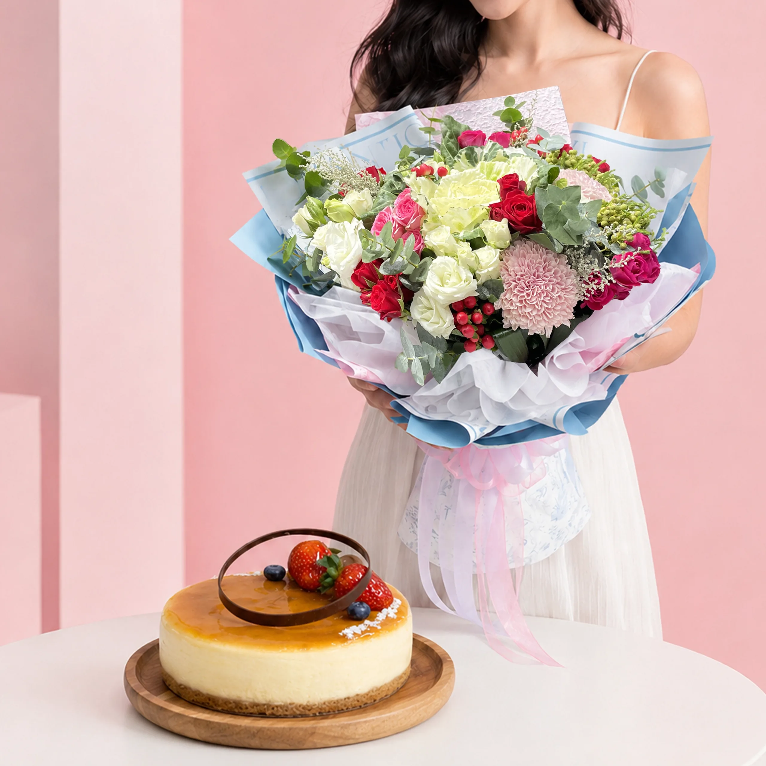 bloom-and-bliss-cake-combo Pink Rose Cake Harmony featuring a hand bouquet of 10 pink roses paired with a Purple Velvet Chiffon Cake and blueberry cream cheese filling for celebrations and gifting.