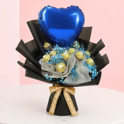 Happy Father's Day Bouquet featuring Ferrero Rocher chocolates, blue-tinted baby’s breath flowers, and a royal blue heart-shaped Happy Father's Day balloon wrapped in elegant presentation paper.