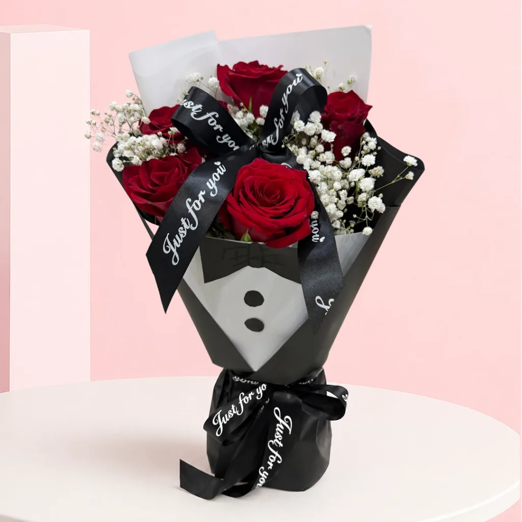 Thank You, Dad Bouquet featuring fresh red roses and delicate baby’s breath arranged in an elegant floral design to express gratitude and appreciation.