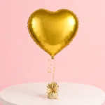 Gold heart-shaped foil balloon with metallic finish for celebrations