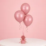 Three rose wood balloons with a modern neutral tone for special occasions.
