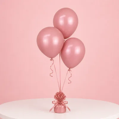 Three rose wood balloons with a modern neutral tone for special occasions.
