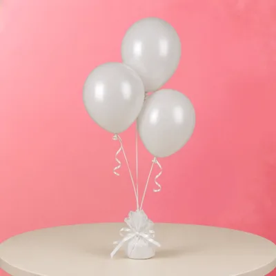 White colour balloon trio complementing modern and classic party themes.