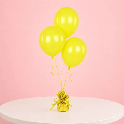 Yellow latex balloon trio for colourful event décor and celebrations.